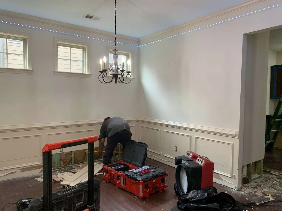 Restoration technician with professional equipment in Beltsville